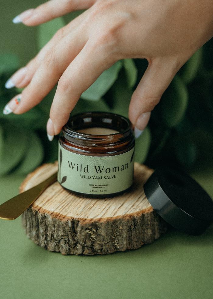 Wild Woman Wild Yam Salve Green Background with Hand